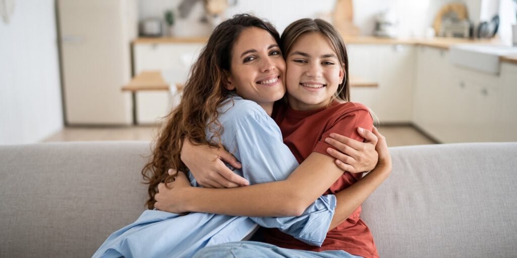 Positive conversation leaves a temporary neural echo in the brain network of mother and child
